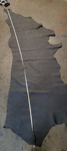 Black embossed leather piece - embossed,